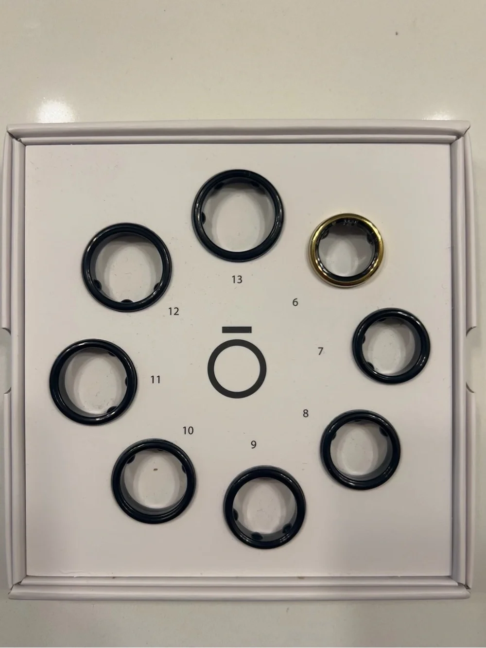 Oura Ring Gen3 in Horizon Gold & Charging Dock